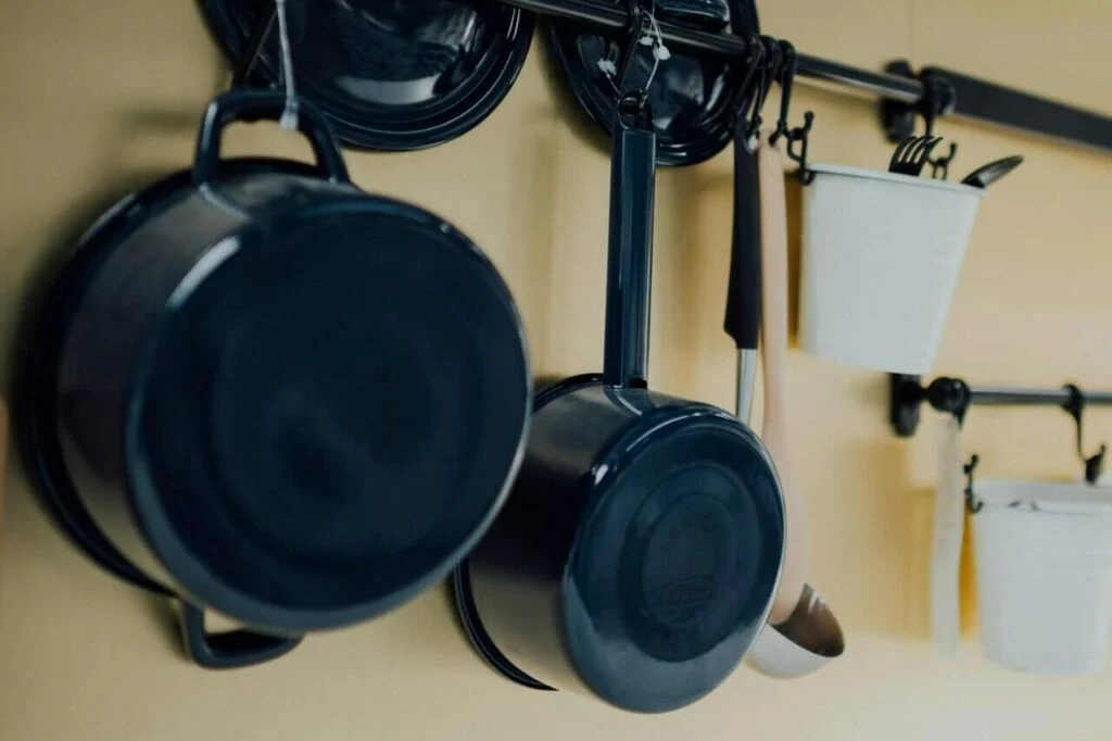RV cooking accessories setup with essential kitchen tools for camping and road travel
