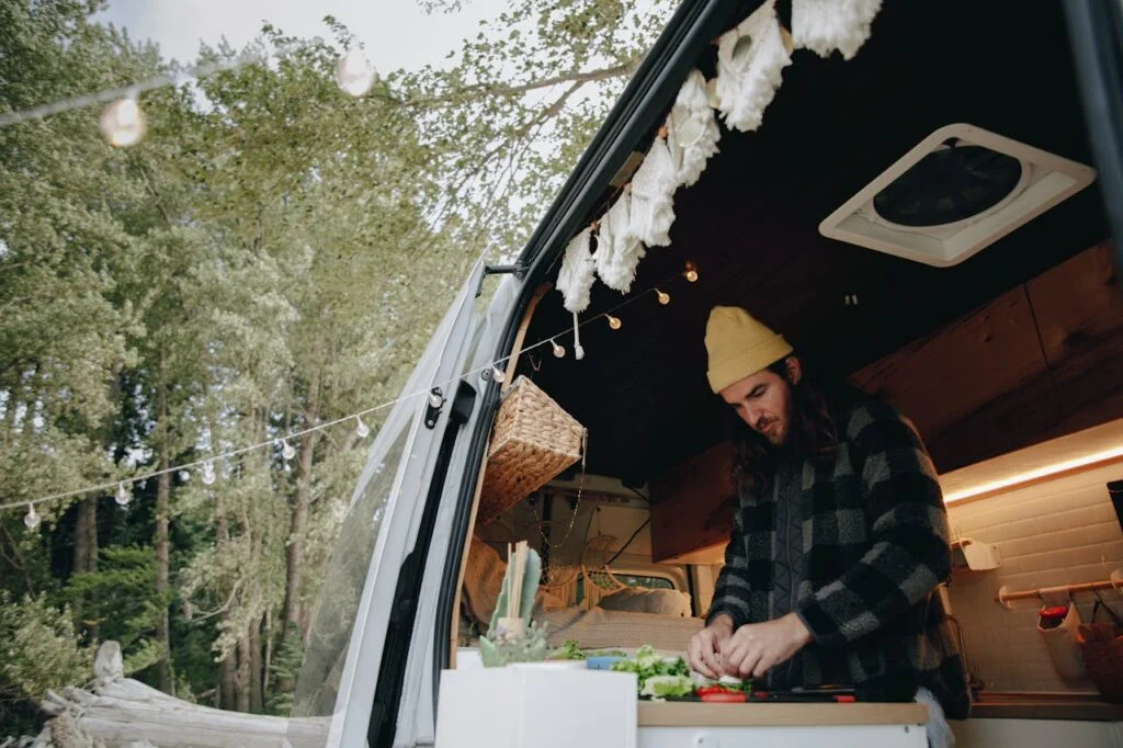 RV living and lifestyle ultimate guide showing full-time RV travel, daily routines, space-saving ideas, and remote work on the road in 2026