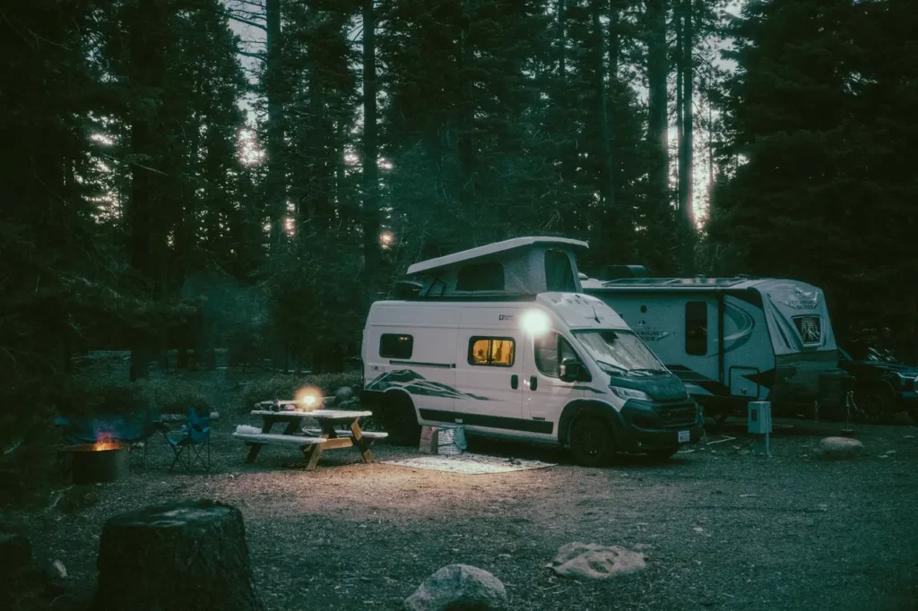 Best RV for boondocking, showing an off-grid RV equipped for remote camping with solar power, large water tanks, and rugged capability.