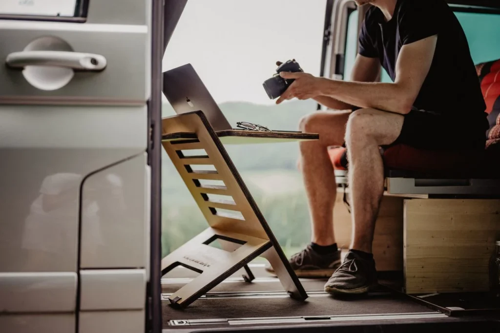 Best RVs for Full-Time Working Travelers, Comparison of the best RVs for full-time working travelers, featuring dedicated workspaces, reliable internet connectivity, spacious interiors, solar power, and comfortable living areas.
