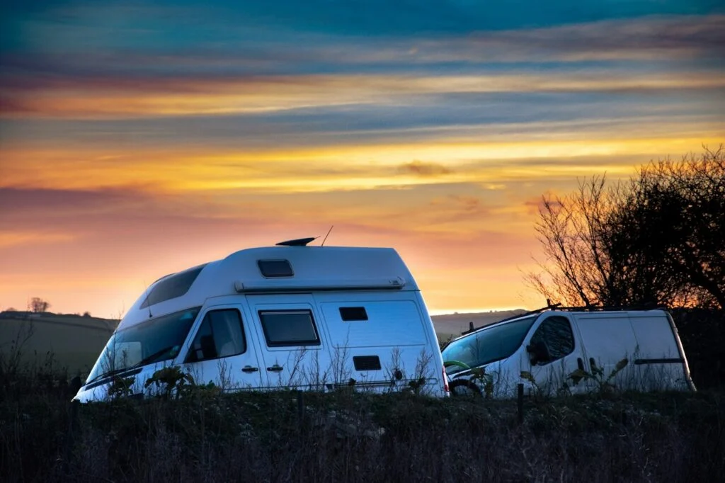 An overview of different RV types and classes including motorhomes, travel trailers, fifth wheels, and campervans, showing a variety of RV options for travel, camping, and full-time living in 2026.